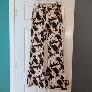 New! Cow print bell bottom rodeo jeans (southern fried chics boutique)
